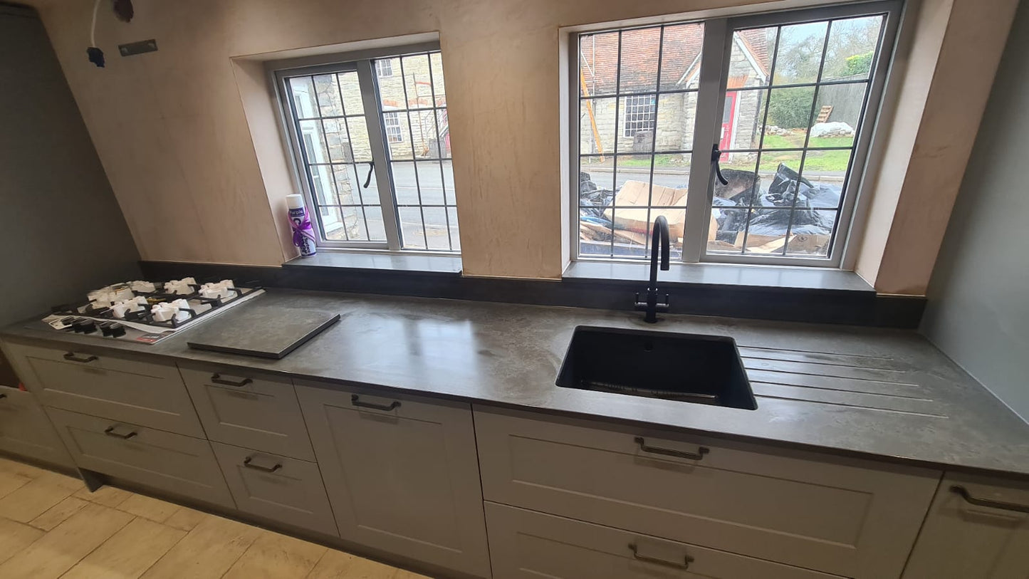 Unistone Tartufo dark grey quartz kitchen worktops