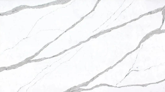 Unistone Arabescato white quartz with darker grey veins spread over the surface.