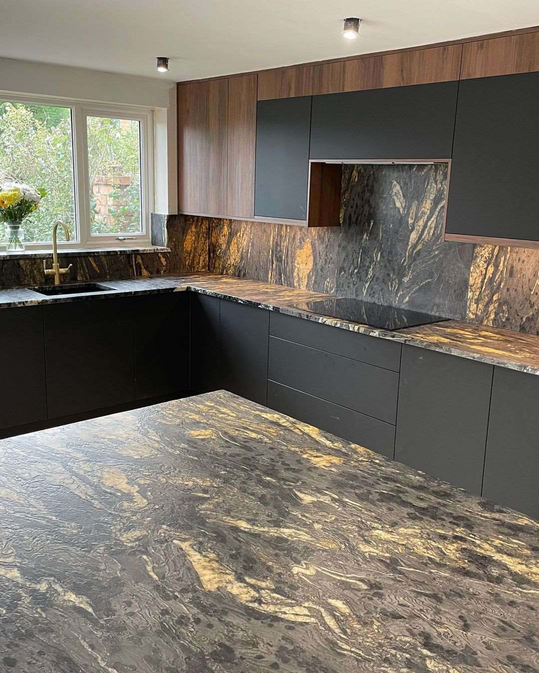Cosmic Black Granite kitchen worktops, gold coloured swirls against a black background