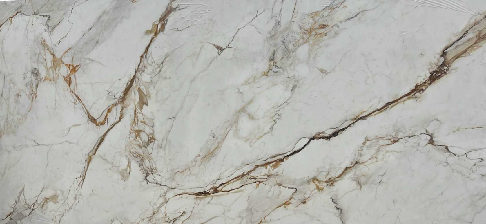 A close-up image of PQS Borgini quartz with a marble effect, showing white base with grey and gold veining.