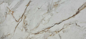 A close-up image of PQS Borgini quartz with a marble effect, showing white base with grey and gold veining.