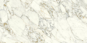 Uniceramica Arabescato Vagli, Ceramic slabs with white-creamy base-colour and darker grey veins spread over the surface.