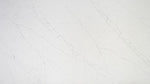 Arctic White quartz slab, grey veining on a white background