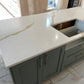 Calacatta Aurous quartz kitchen worktops with a cool white base with vivid gold and subtle grey veining intermixed elegantly.