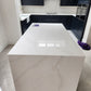 Calacatta gold quartz kitchen worktops with grey veins married with delicate gold veins throughout the slab on a white background.