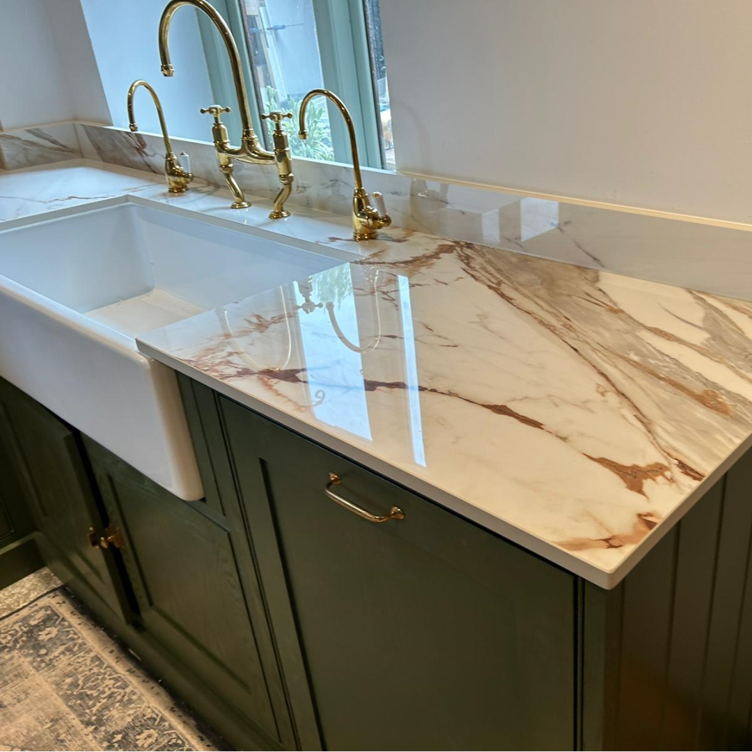 Ceralsio Macchia Vecchia Kitchen worktops with green cabinetry