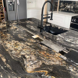 Cosmic Black Granite kitchen worktops, gold coloured swirls against a black background