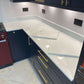 Fugen Calacatta Oro marble effect Quartz kitchen worktops with soft grey veining and gold veins running through it.