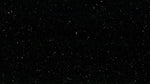 Star Galaxy granite slab, Black, speckled medium coarse grained granite with scattered yellow / gold shiny speckles.