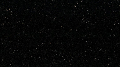 Star Galaxy granite slab, Black, speckled medium coarse grained granite with scattered yellow / gold shiny speckles.