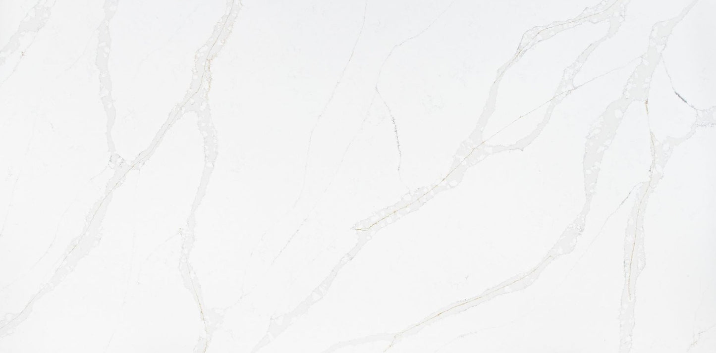 Calacatta gold quartz slab with grey veins married with delicate gold veins throughout the slab. 