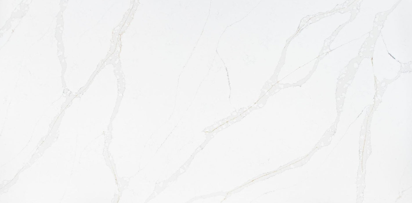 Calacatta gold quartz slab with grey veins married with delicate gold veins throughout the slab. 
