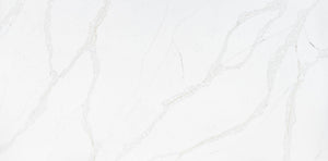 Calacatta gold quartz slab with grey veins married with delicate gold veins throughout the slab. 
