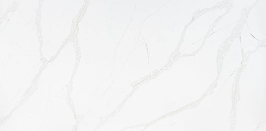 Calacatta gold quartz slab with grey veins married with delicate gold veins throughout the slab. 