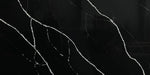 Black Marquina quartz slab, black marble-look quartz with white veining.
