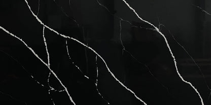Black Marquina quartz slab, black marble-look quartz with white veining.
