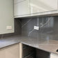 Unistone Pietra Grey Quartz kitchen worktops with white veins through it