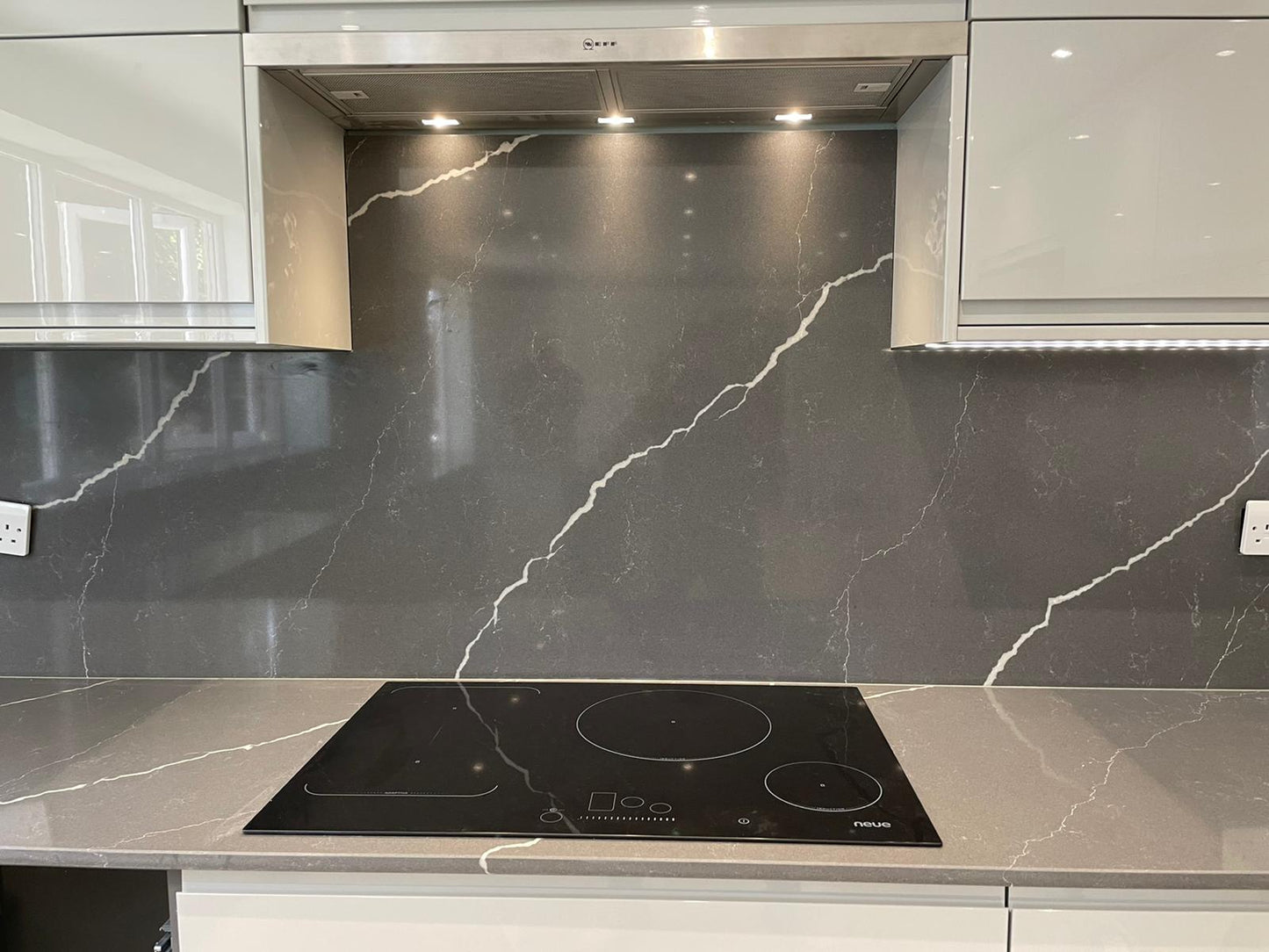 Unistone Pietra Grey Quartz kitchen worktops with white veins through it