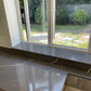 Unistone Pietra Grey Quartz kitchen worktops with white veins through it