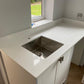 Worldwide Stones Super White Quartz kitchen worktop with drainer grooves
