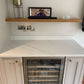 Calacatta Platinum quartz kitchen worktops with a white background which is enhanced by grey and gold veining.