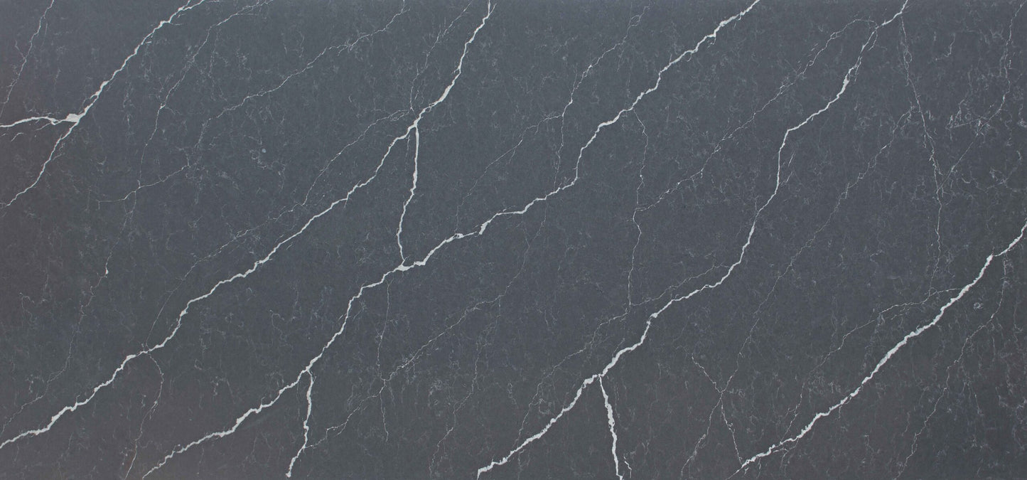 Unistone Pietra Grey Quartz slab with white veins through it