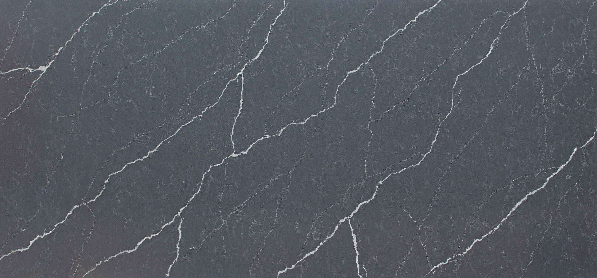 Unistone Pietra Grey Quartz slab with white veins through it