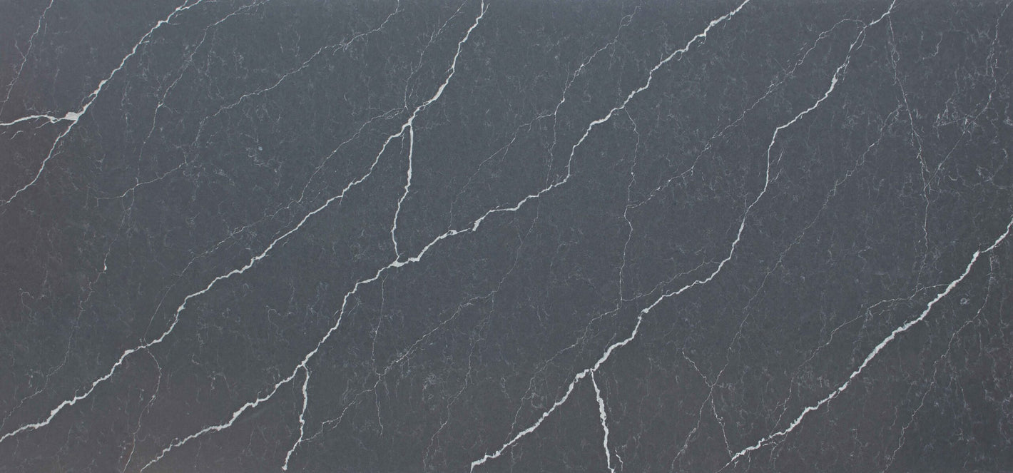 Unistone Pietra Grey Quartz slab with white veins through it